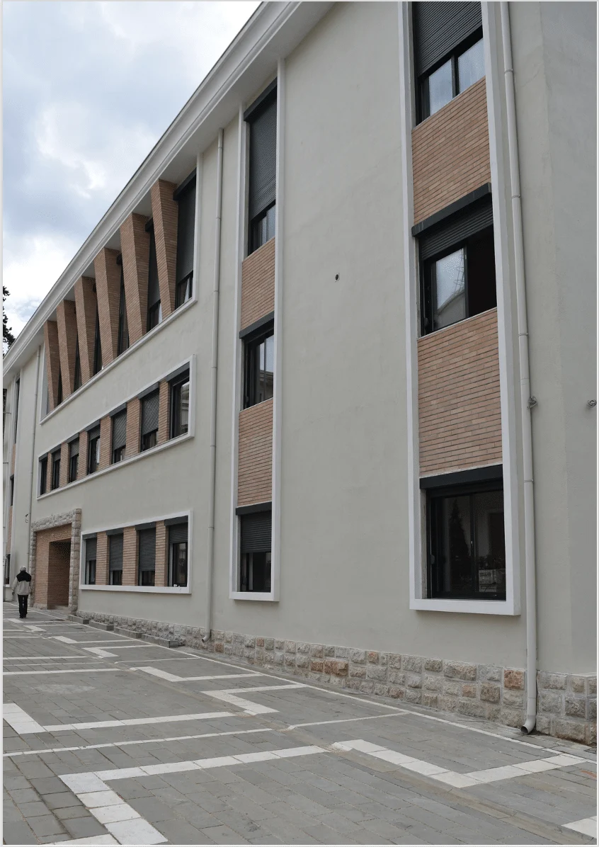 The reconstructed façade of the KQZ administrative building in Tirana.